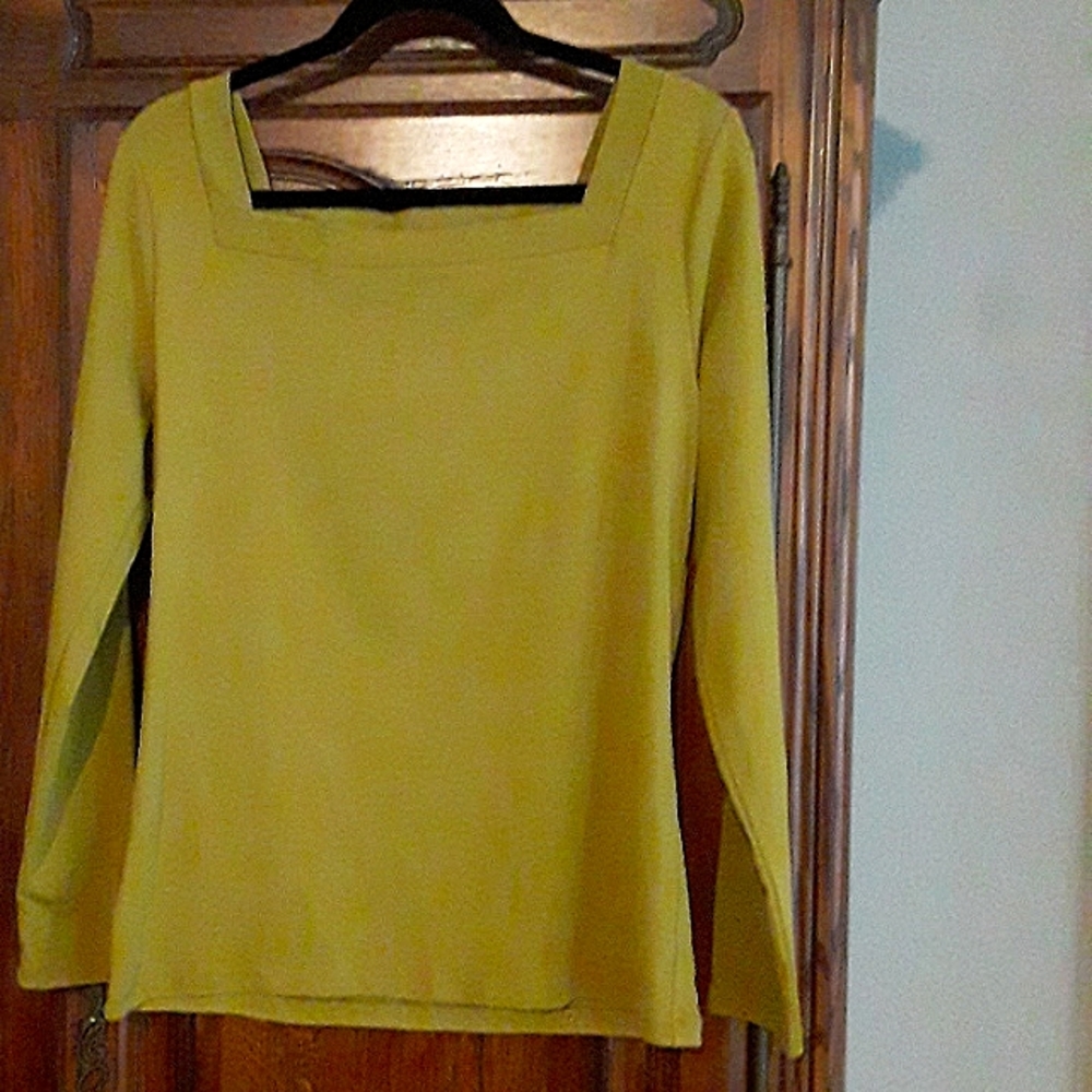 Mustard colored top with a square neckline